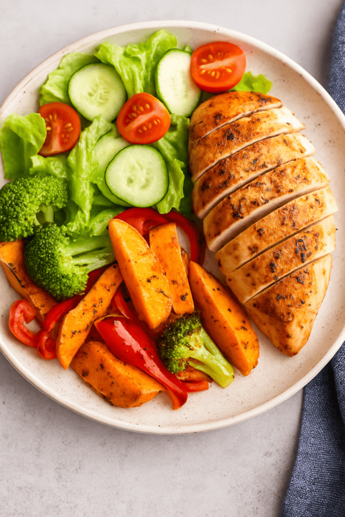 A delicious and vibrant dish of seasoned grilled chicken with fresh vegetables, showcasing a colorful and flavorful meal, emphasizing that diabetic diets can be tasty and exciting.